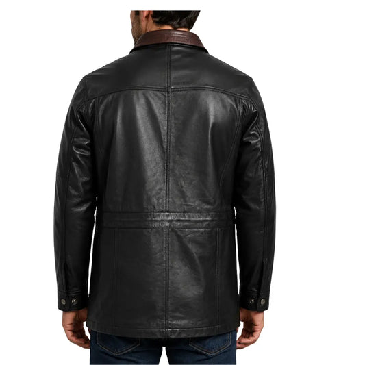 Back view of men's hip length black leather winter car coat with brown trim on a male model.