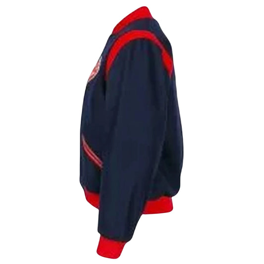 Men’s vintage blue wool letterman jacket side view with ribbed cuffs and collar