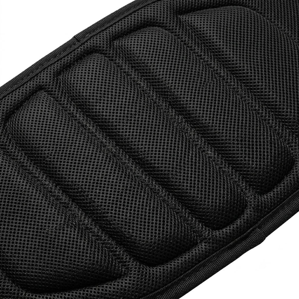 The Apex black mesh weightlifting belt close-up detail showing contoured lumbar padding channels and mesh texture by Trico Gear