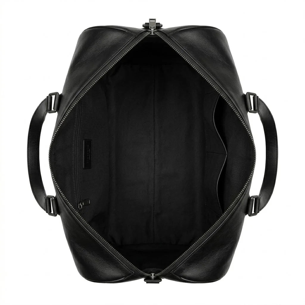 The Hawke genuine black leather duffle bag open interior showing black lining zippered pocket gunmetal details by Trico Gear