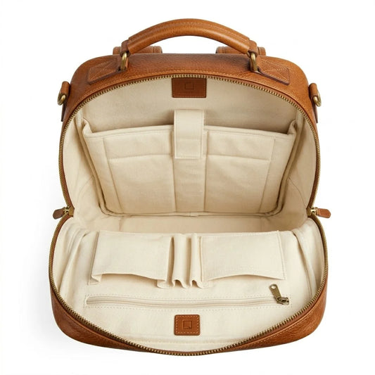 The Pemberton genuine brown leather backpack open interior cream canvas lining padded laptop sleeve organiser panel by Trico Gear