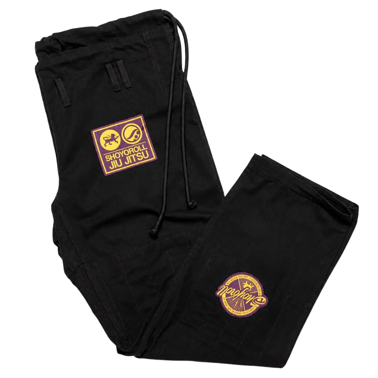 Black Brazilian Jiu-Jitsu Gi pants close-up with reinforced stitching and logo