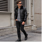 Men’s black G-1 leather flight jacket worn by a Western male model