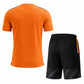 Orange soccer jersey with black football shorts team uniform