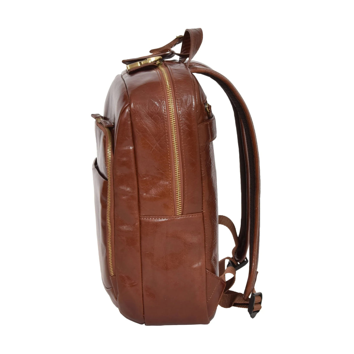 Side view of the structured Peru Tan leather backpack highlighting its slim profile, durable brass zippers, and contoured shoulder strap design