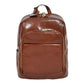 Front view of the premium Peru Tan leather backpack featuring high-gloss finish, dual zippered compartments, and an attached leather luggage tag