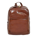 Front view of the premium Peru Tan leather backpack featuring high-gloss finish, dual zippered compartments, and an attached leather luggage tag