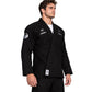 Shoyoroll Batch 115 RVCA x Heartbreakers black BJJ Gi worn by a male model, front view