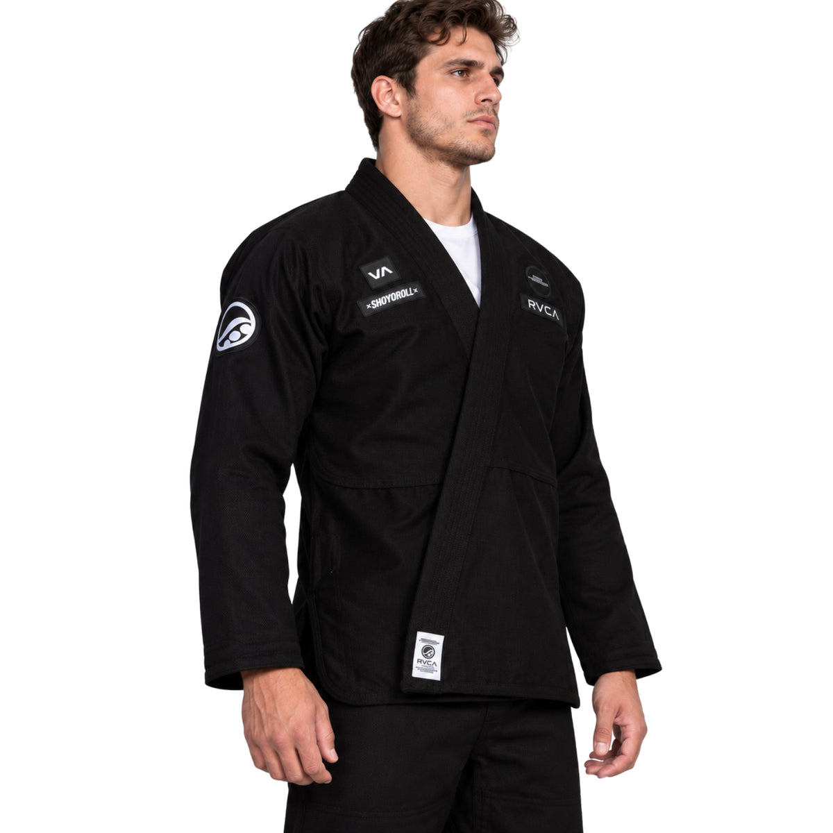 Shoyoroll Batch 115 RVCA x Heartbreakers black BJJ Gi worn by a male model, front view