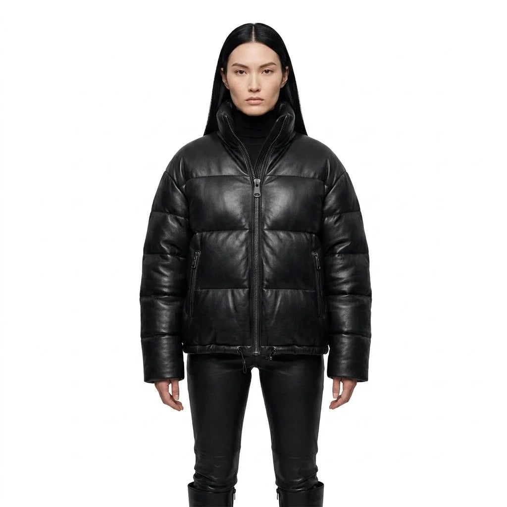 The Aspen womens genuine black cowhide leather puffer jacket front view quilted panels gunmetal zipper by Trico Gear