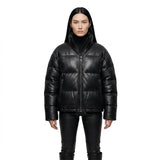 The Aspen womens genuine black cowhide leather puffer jacket front view quilted panels gunmetal zipper by Trico Gear