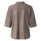 Back view of The Nero Women's Leather Shirt Mud Grey highlighting the straight horizontal shoulder yoke seam, fine vertical center stitching, and relaxed curved hem
