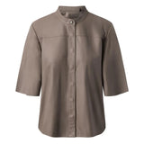Front view of The Nero Women's Leather Shirt Mud Grey showcasing its minimalist mandarin band collar, hidden button placket, and tailored elbow-length sleeves