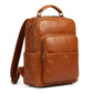 The Pemberton genuine cognac brown cowhide leather backpack front view antique brass hardware laptop sleeve by Trico Gear
