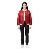 The Vale womens genuine cherry red cowhide leather varsity jacket front cream ribbed trim chrome snap buttons by Trico Gear