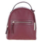 Front view of The Verona Real Leather Small Burgundy Backpack highlighting its premium pebbled leather texture, classic dome silhouette, top grab handle, and horizontal zipped pocket with long leather pulls
