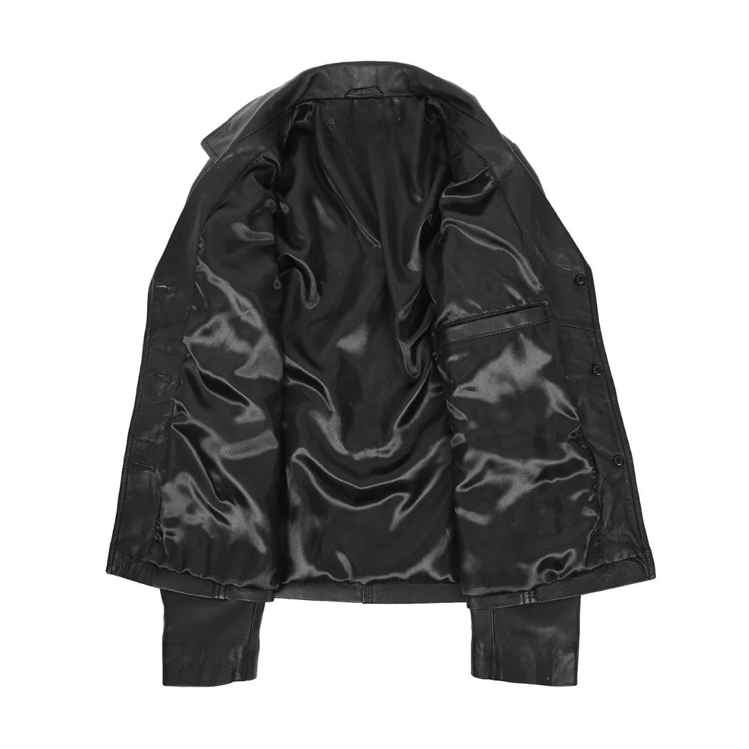 Interior lining of The Verona women's black leather blazer showing the smooth black satin material, inner slip pocket, and quality brand label