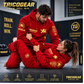 Tricogear TRI 28 R-G red and gold BJJ hoodie worn during Brazilian Jiu-Jitsu training
