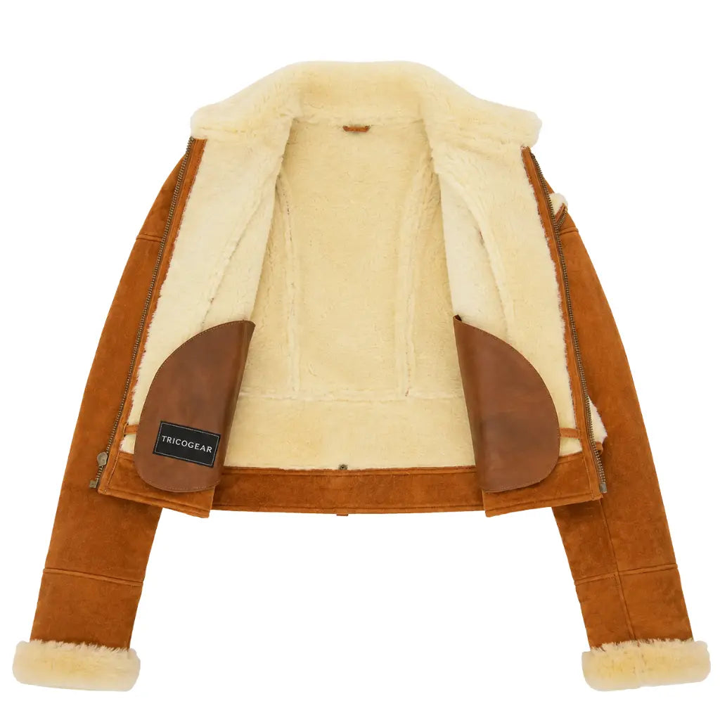 Interior view of Women's Genuine Sheepskin Aviator Jacket Nora Tan & White Pilot Coat featuring full shearling lining and TRICOGEAR branding