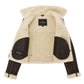 Interior view of the women's genuine sheepskin RAF aviator jacket displaying the full white shearling lining, leather pocket trim, and TricoGear branded label.