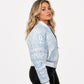 Women’s Unchained embroidered leather jacket side view with Detroit-inspired graphics